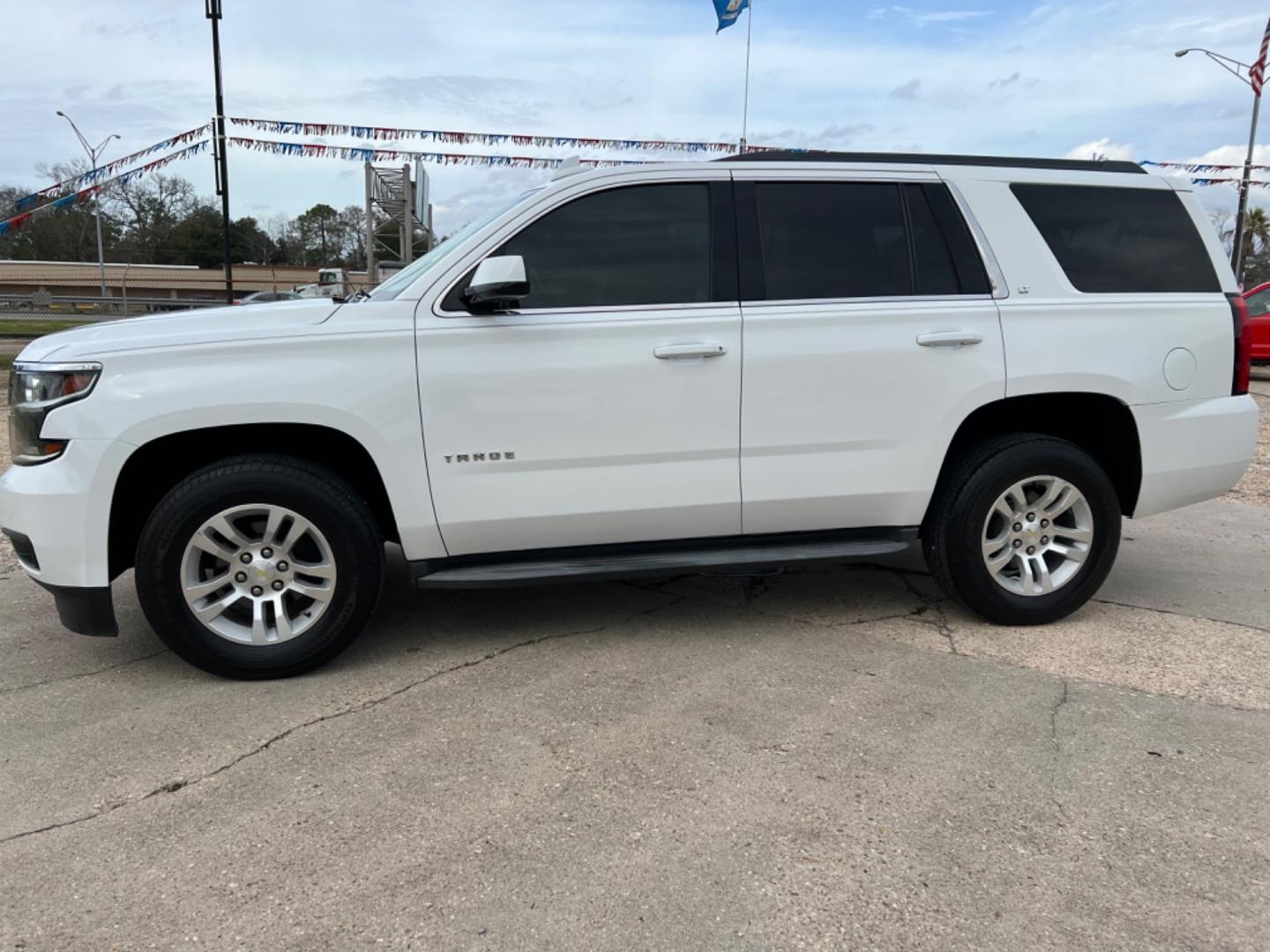 2015 White /Tan Chevrolet Tahoe LT (1GNSCBKC2FR) with an 5.3L V8 engine, Automatic transmission, located at 4520 Airline Hwy, Baton Rouge, LA, 70805, (225) 357-1497, 30.509325, -91.145432 - 2015 Chevy Tahoe LT 5.3 V8 Gas, 146K Miles, All Power, Heated Leather Seats, 7 Passenger Seating, Bose, Backup Camera, Tow Pkg. NO IN HOUSE FINANCING. FOR INFO PLEASE CONTACT JEFF AT 225 357-1497 CHECK OUT OUR A+ RATING WITH THE BETTER BUSINESS BUREAU WE HAVE BEEN A FAMILY OWNED AND OPERATED BUSINES - Photo#1